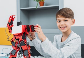 boy-working-with-robot-at-stem-robotics-lesson-2022-12-02-22-15-06-utc-1.jpg